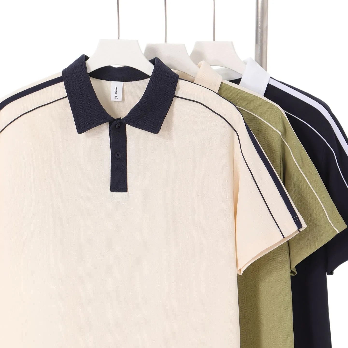 Casual lapel short sleeve polo shirt in cotton blend with drop shoulder loose fit