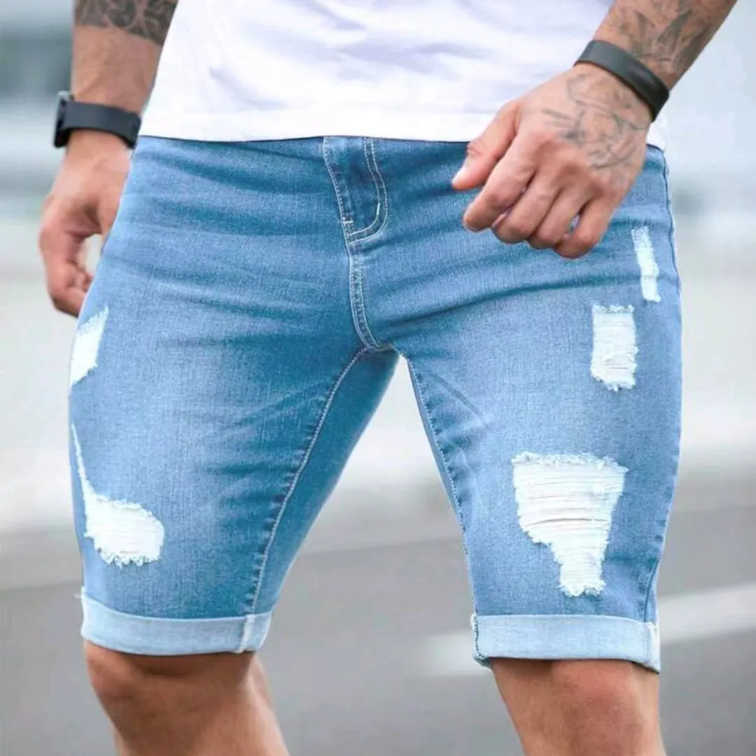 Sky blue men's denim shorts with distressed multi-hole detailing and low waist design