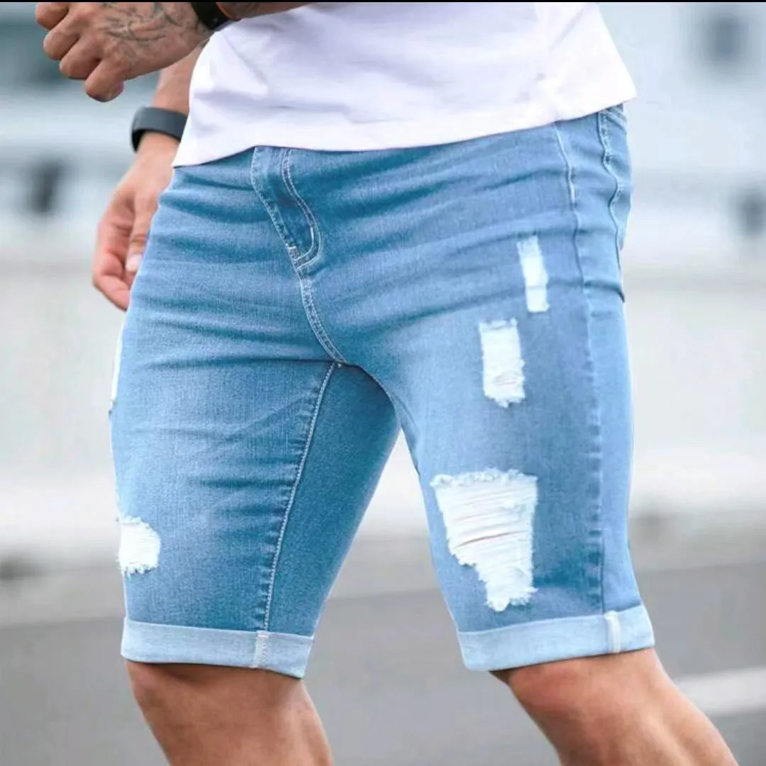 Sky blue men's denim shorts with distressed multi-hole detailing and low waist design