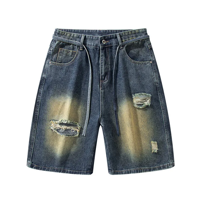 Retro blue loose fit ripped jeans with distressed detailing on denim fabric