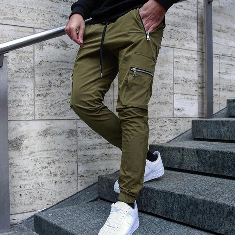 Men's zipper multi-pocket loose fit trousers in black, 95% polyester chemical fiber blend, with belt and small leg opening