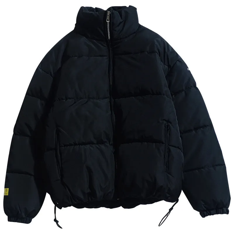 Thick polyester zip-up cardigan in black, loose fit, with zipper pockets and straight hem