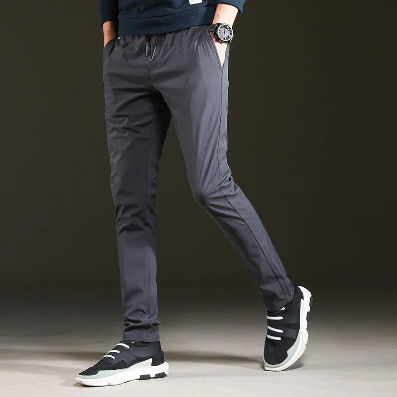 Men's slim cropped sweatpants in black with elasticated waist and relaxed fit, available in multiple sizes up to 5XL
