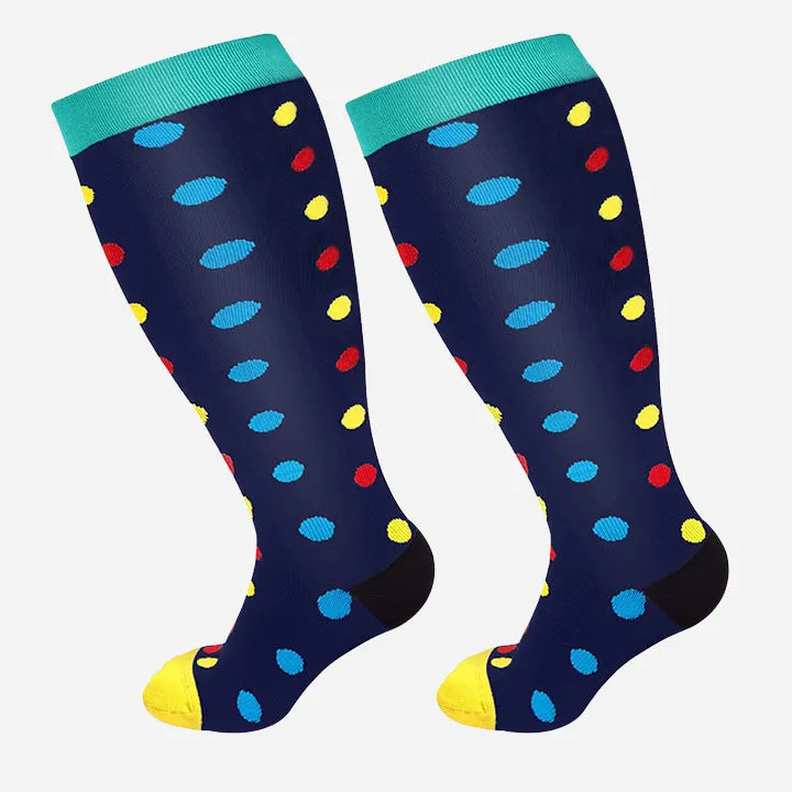 Plus size compression socks for extra wide calf in blue ECG pattern on white background