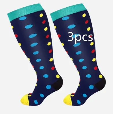 Plus size compression socks for extra wide calf in blue ECG pattern on white background