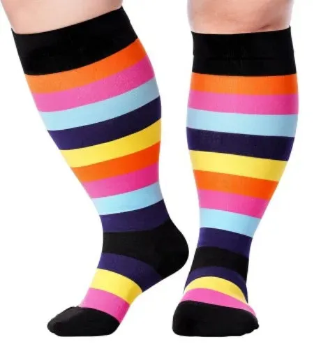 Plus size compression socks for extra wide calf in blue ECG pattern on white background