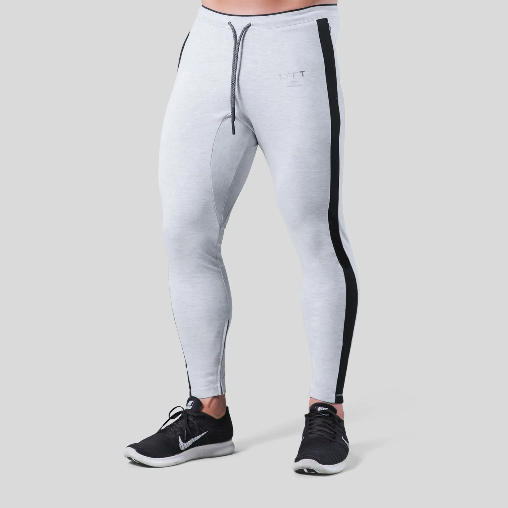 Men's polyester fitness training pants in green, black, navy blue and grey colours for gym workout and bodybuilding