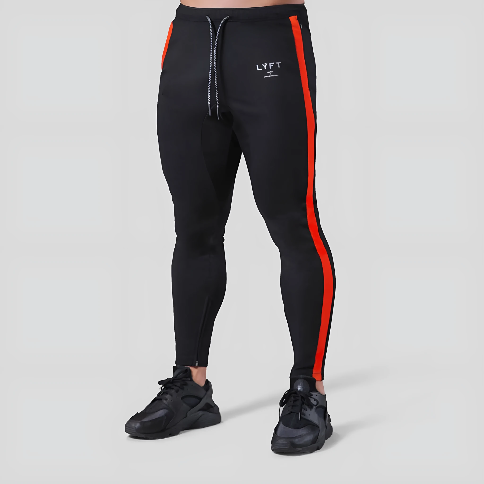 Men's polyester fitness training pants in green, black, navy blue and grey colours for gym workout and bodybuilding