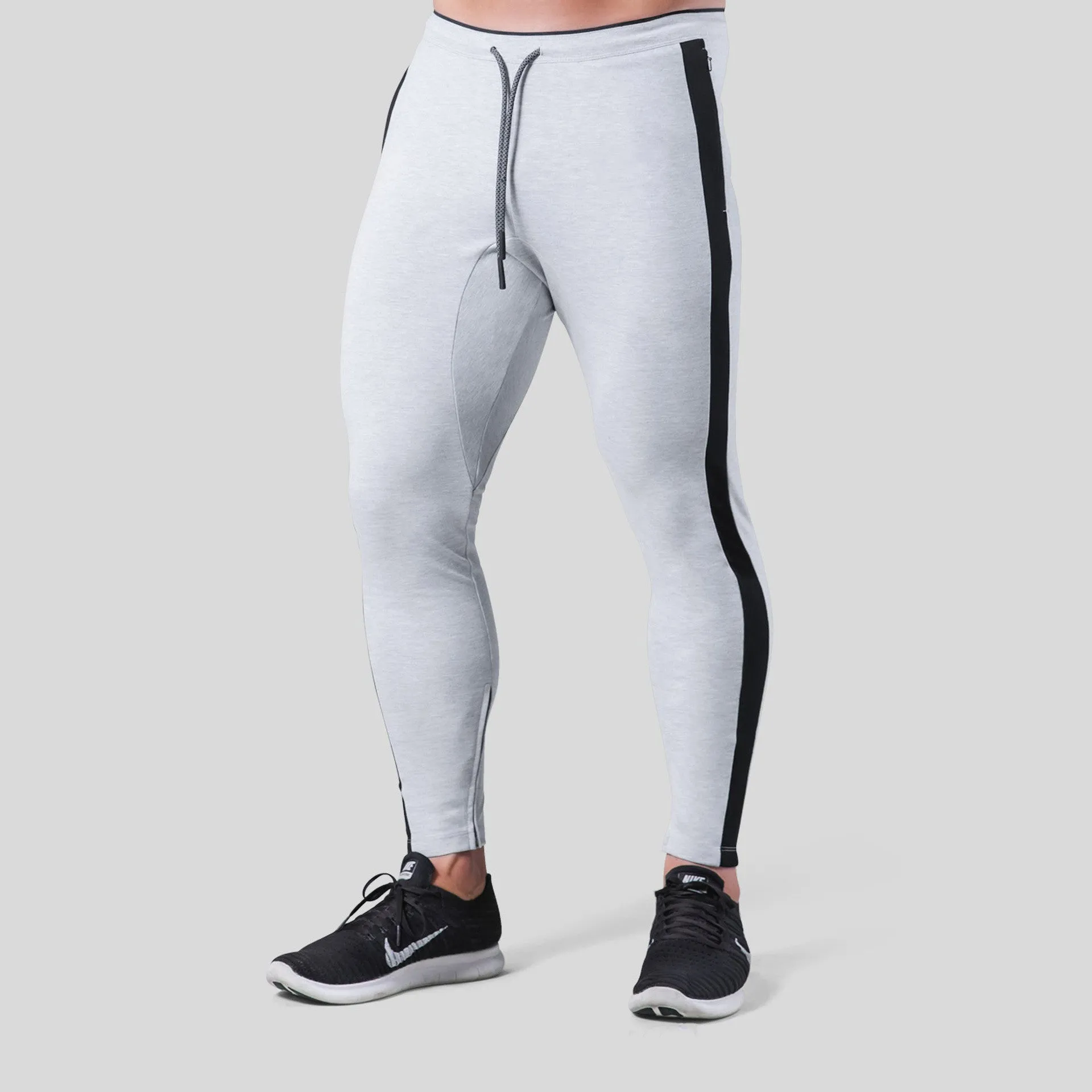 Men's polyester fitness training pants in green, black, navy blue and grey colours for gym workout and bodybuilding