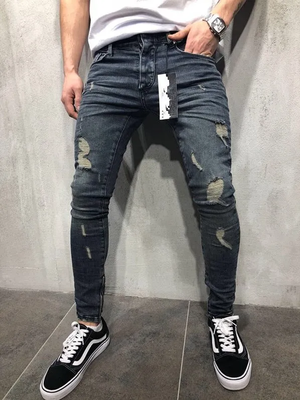 Men's gray blue stretch biker jeans with hole details, slim fit, on a model