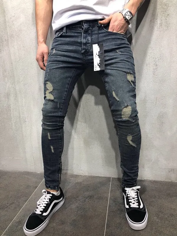 Men's gray blue stretch biker jeans with hole details, slim fit, on a model