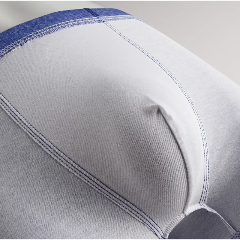Cotton men's body sculpting boxer briefs in light blue with breathable knit and hip lift design