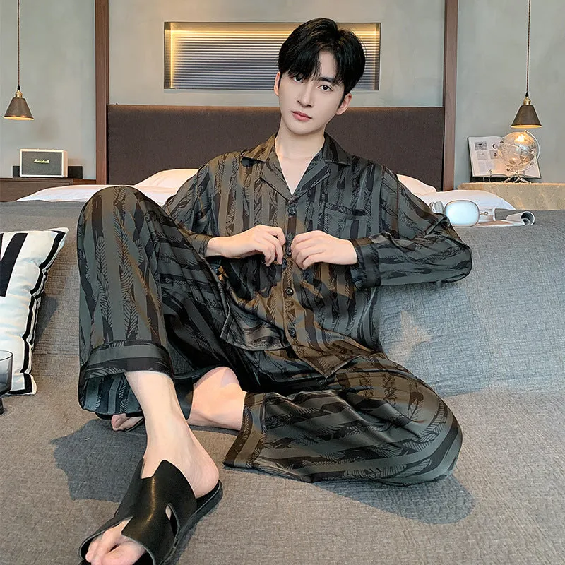 Men's black striped ice silk pajama two-piece set with V-neck top and long trousers.