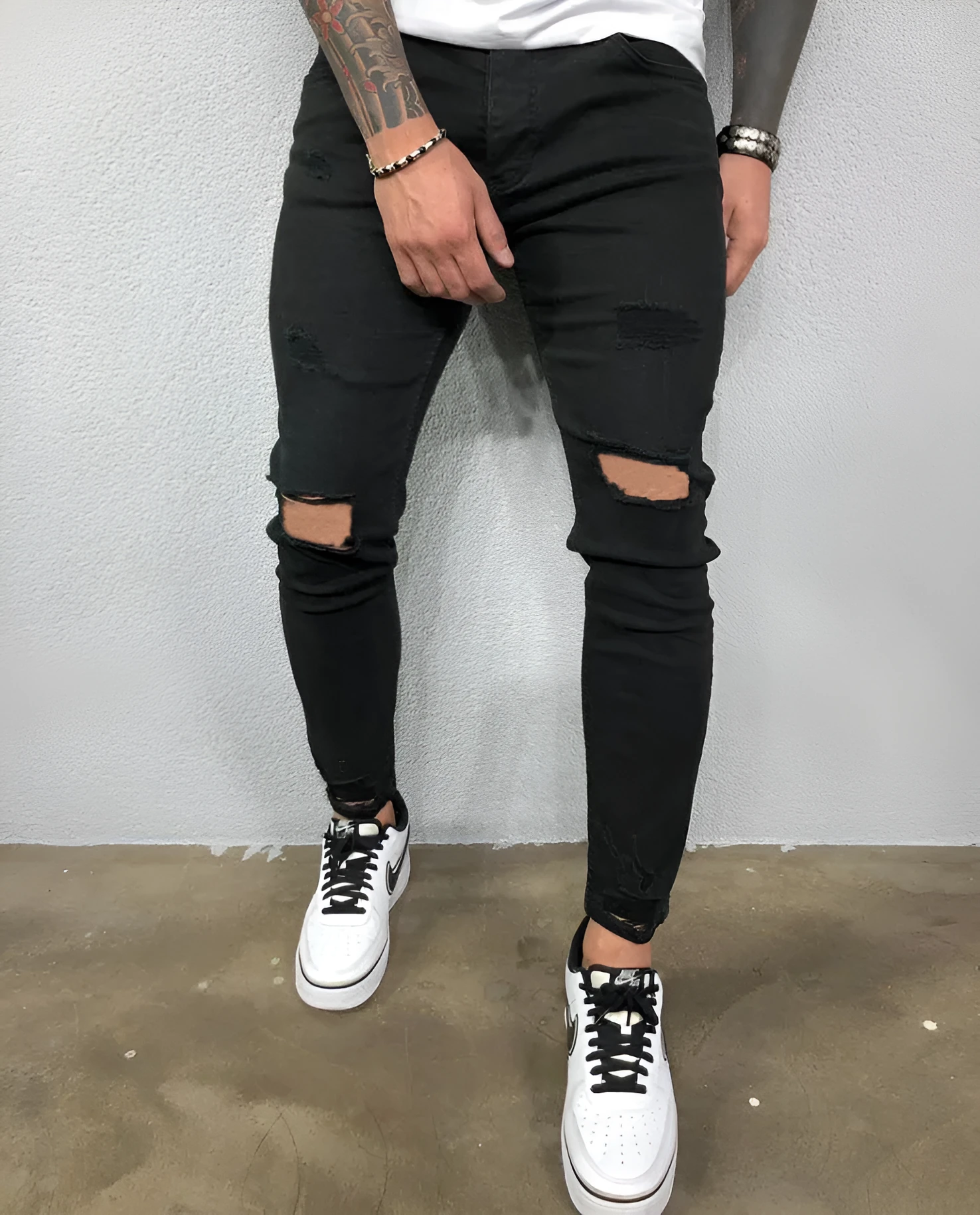 Men black stretch skinny ripped denim jeans with knee holes and zip fly