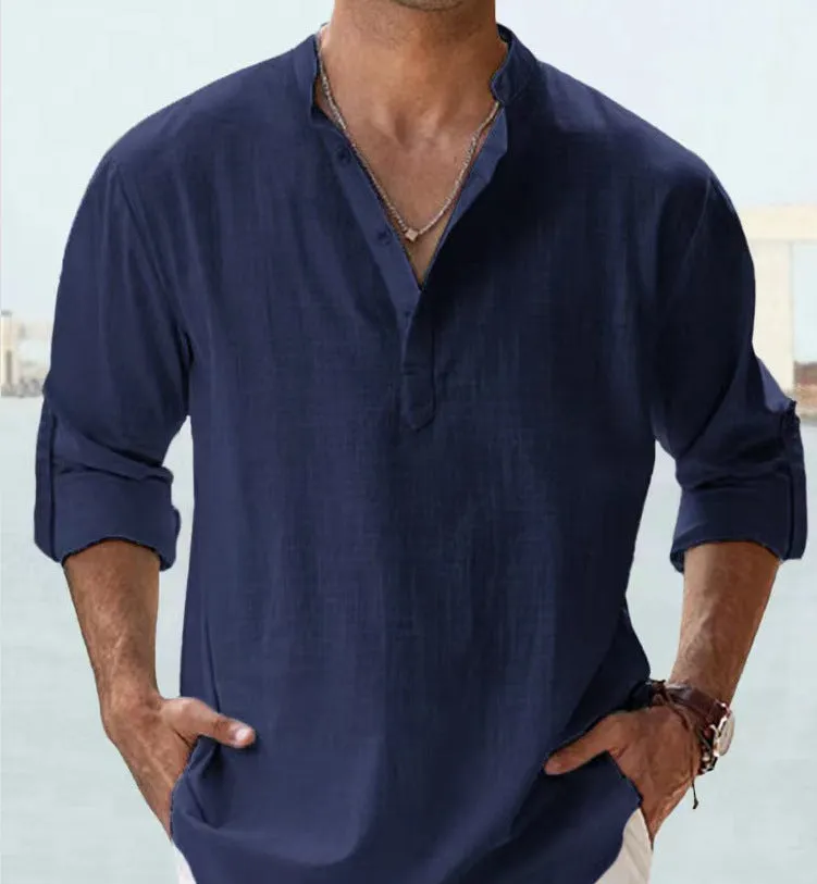 Casual men's loose fitting blue long sleeve shirt with standing collar and stitching details