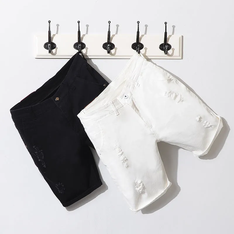Men's cotton denim shorts in black with loose straight-leg cut and mid-waist zipper closure