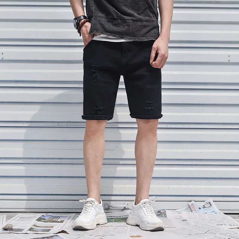 Men's cotton denim shorts in black with loose straight-leg cut and mid-waist zipper closure