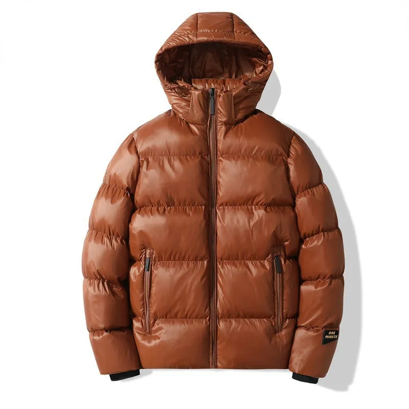 Loose fit solid colour hooded cotton jacket in army green with side seam pockets on one person