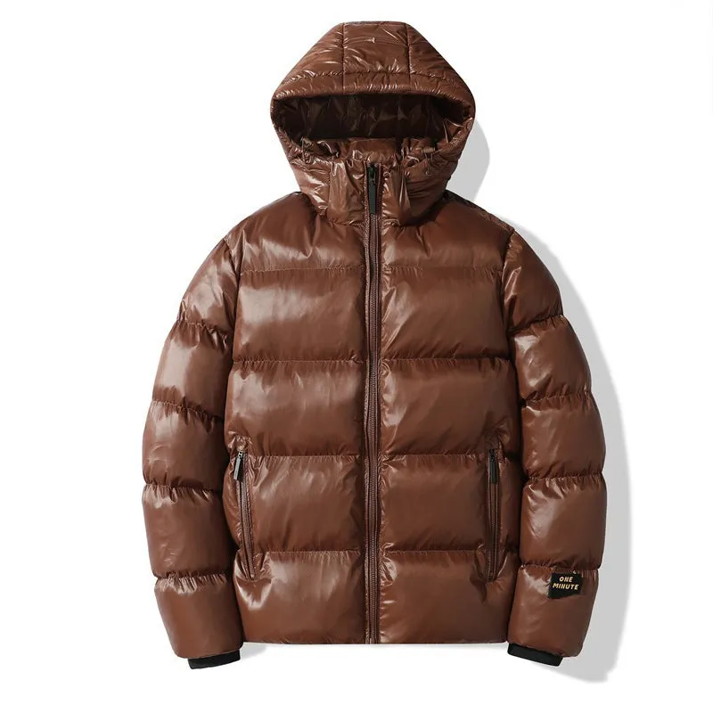 Loose fit solid colour hooded cotton jacket in army green with side seam pockets on one person