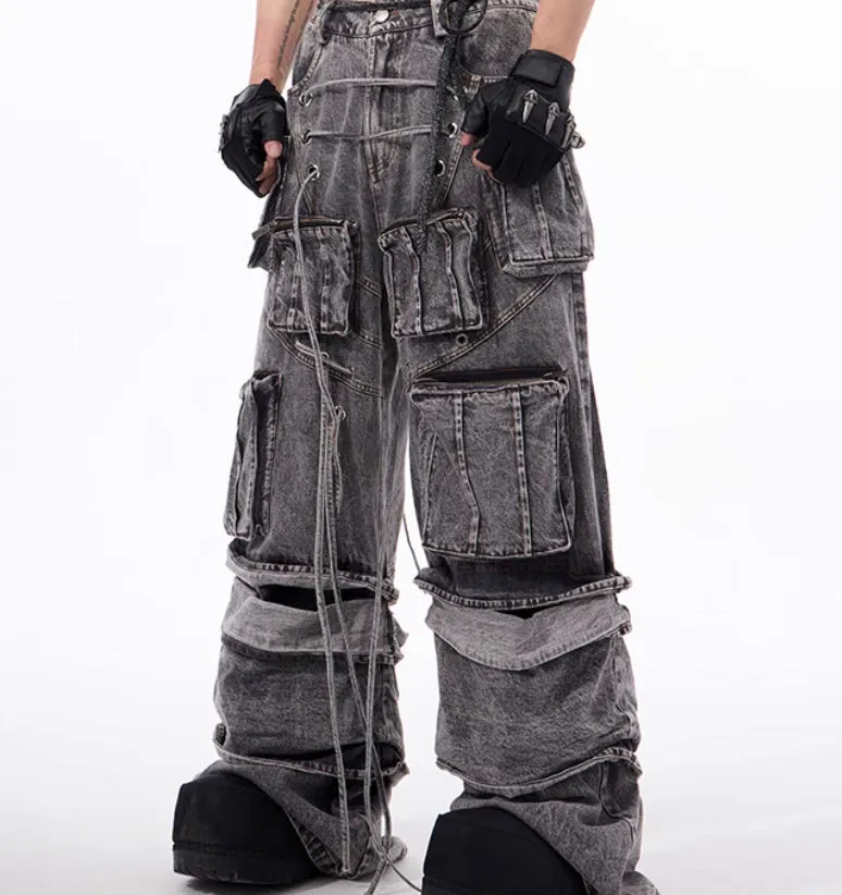 Grey distressed denim overalls with rope stitching on a hanger