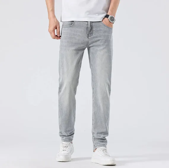 Men's light grey slim straight leg jeans with cotton no-iron finish, straight cut with small tube cuff
