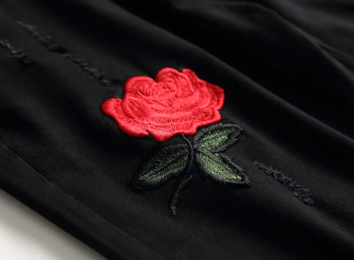 Black high-waist rose-embroidered shredded stretch denim jeans for women