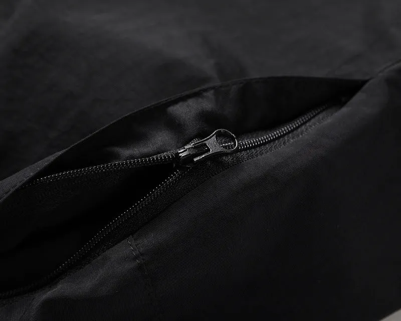Mens RO style loose cotton shorts with drawstring belt and multiple pockets, shown in black and light green.