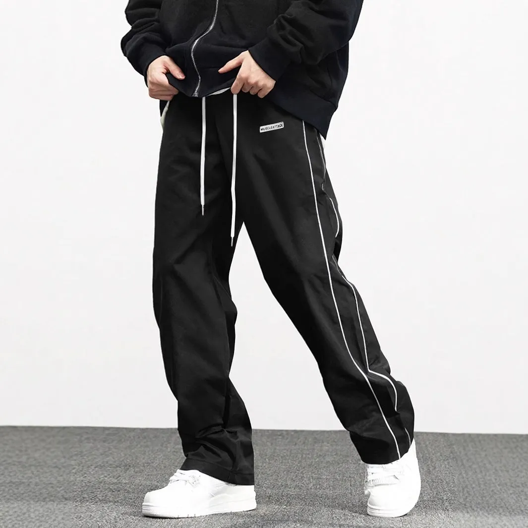 Men's loose fit polyester cargo trousers with side pockets in black, navy blue, and dark green