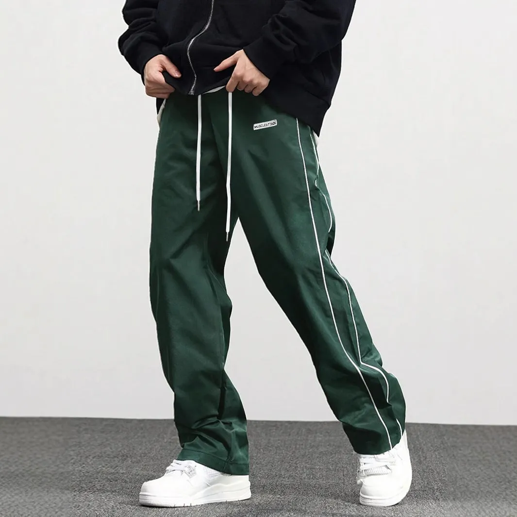 Men's loose fit polyester cargo trousers with side pockets in black, navy blue, and dark green