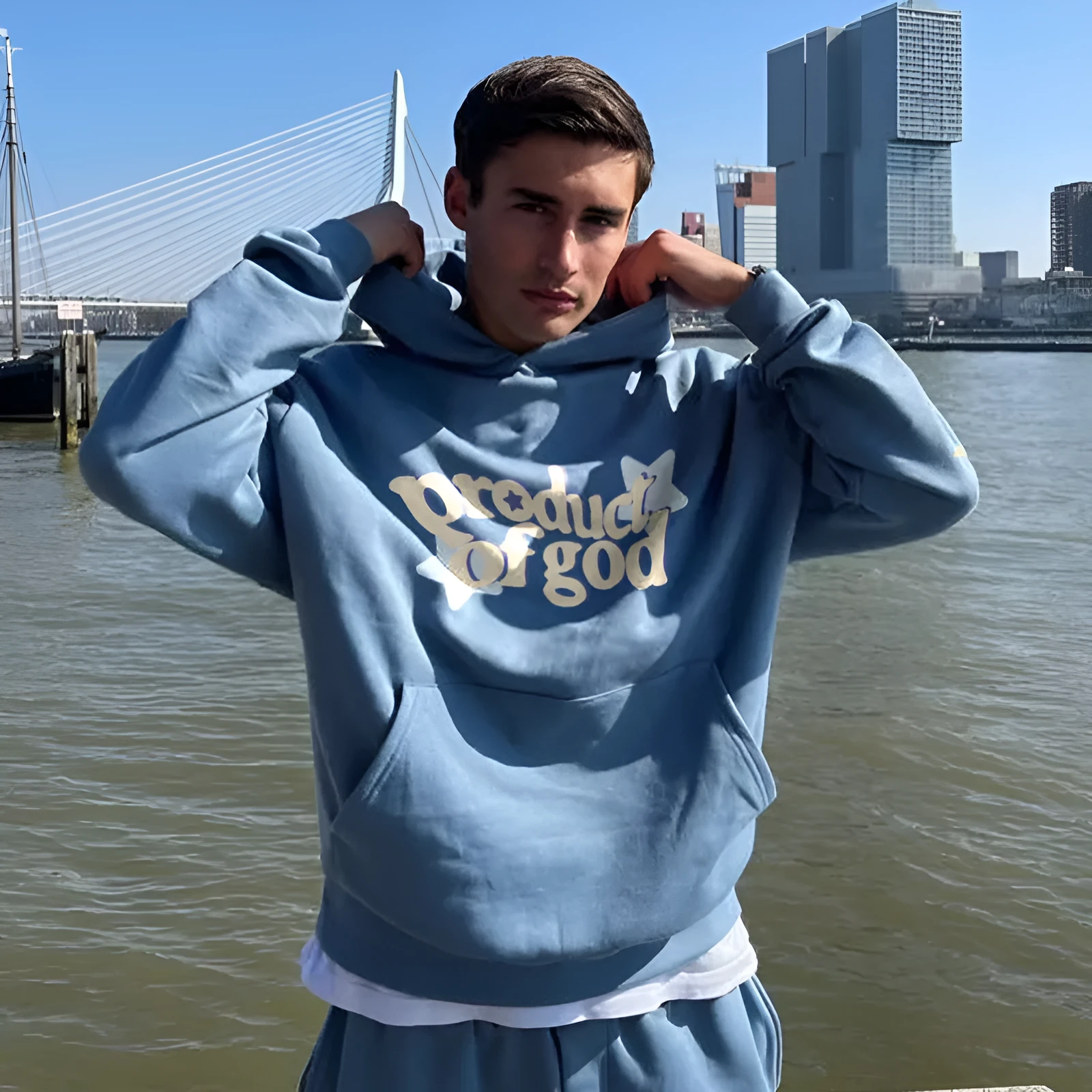 Men's polyester pullover hoodie with drawstring hood and front pocket in blue