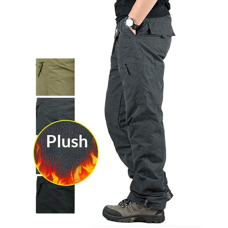 Man wearing thickened warm windproof waterproof fleece lined cotton trousers in army green with belt and double-layer waistband