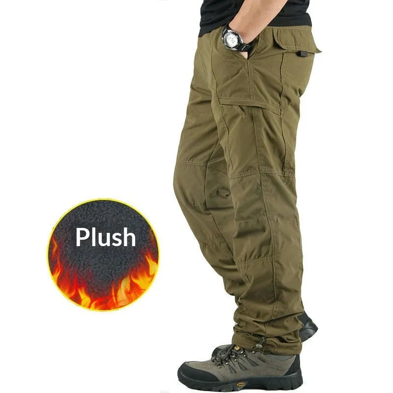 Man wearing thickened warm windproof waterproof fleece lined cotton trousers in army green with belt and double-layer waistband