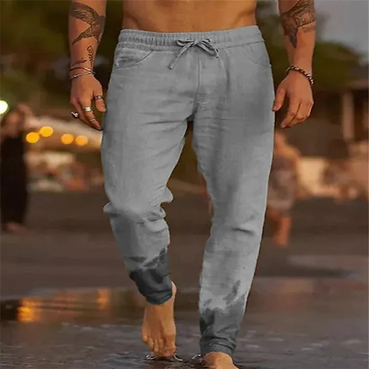 Men's solid colour cotton linen loose beach casual pants with elastic waist, shown in grey on a plain background