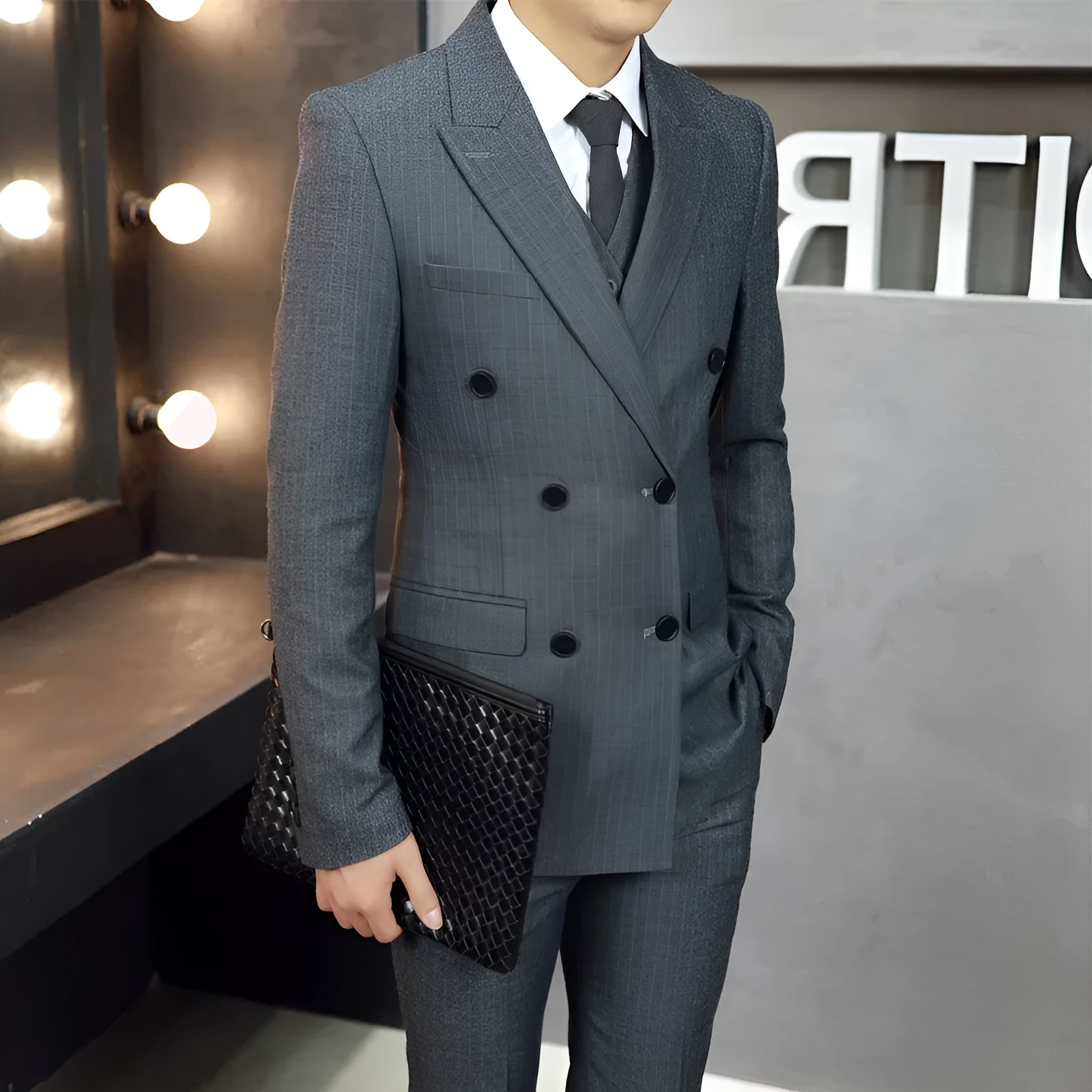 Men's three-piece suit set in slim fit with jacket, vest, and trousers in black
