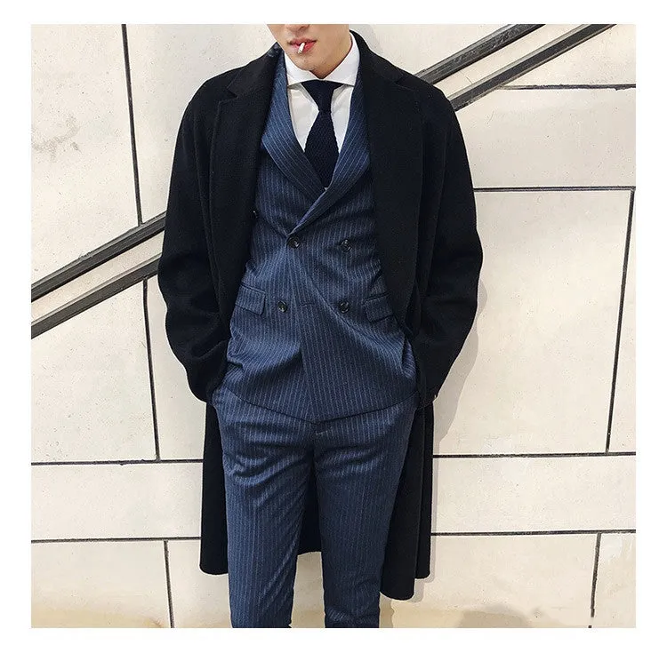 Men's three-piece suit set in slim fit with jacket, vest, and trousers in black