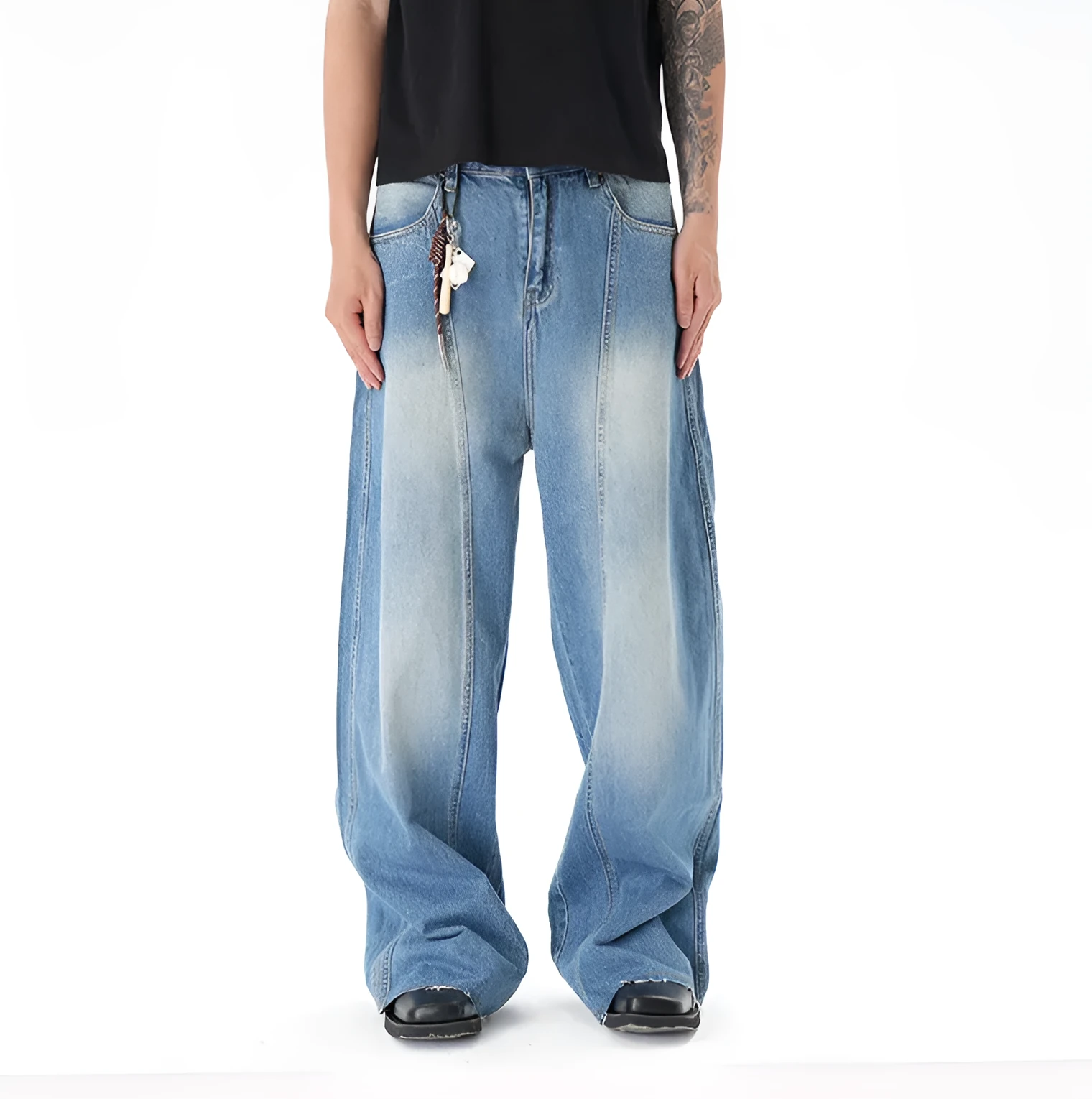 Light blue vintage washed wide leg denim jeans with a zipper fly on a mannequin.