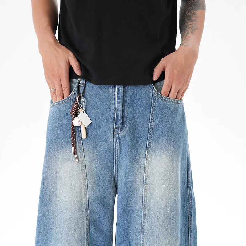 Light blue vintage washed wide leg denim jeans with a zipper fly on a mannequin.