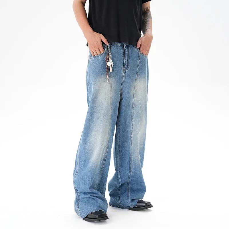 Light blue vintage washed wide leg denim jeans with a zipper fly on a mannequin.