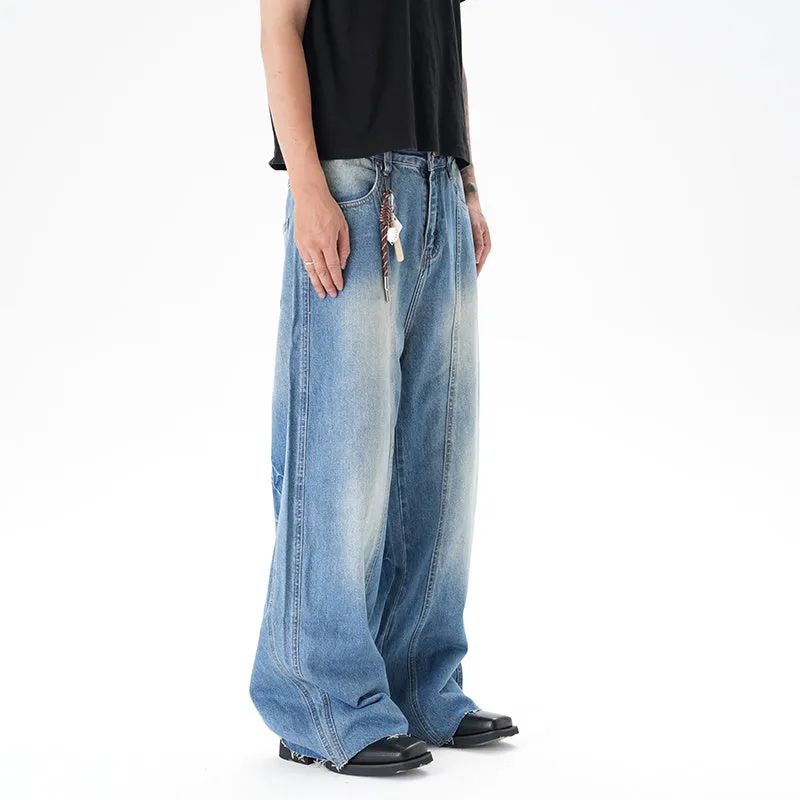 Light blue vintage washed wide leg denim jeans with a zipper fly on a mannequin.