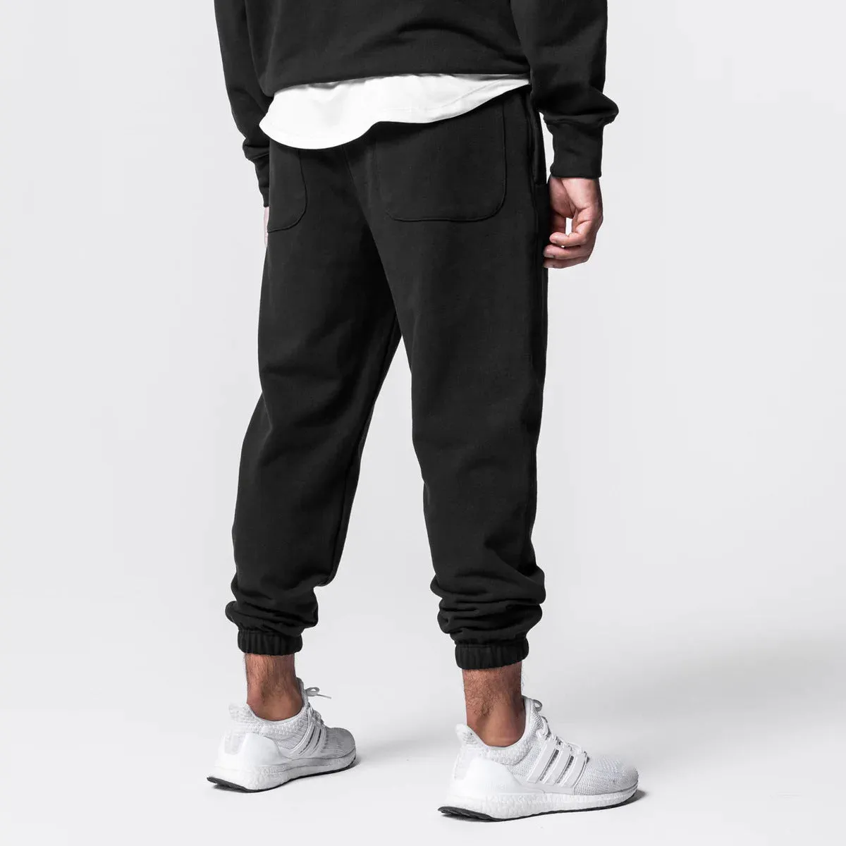 Men's cotton hoodie and jogger tracksuit set in black with pullover top and trousers for sports