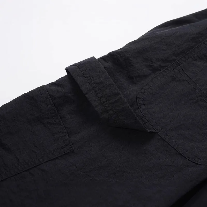 Black paratrooper pants with elastic waist and baggy style European American high street cut