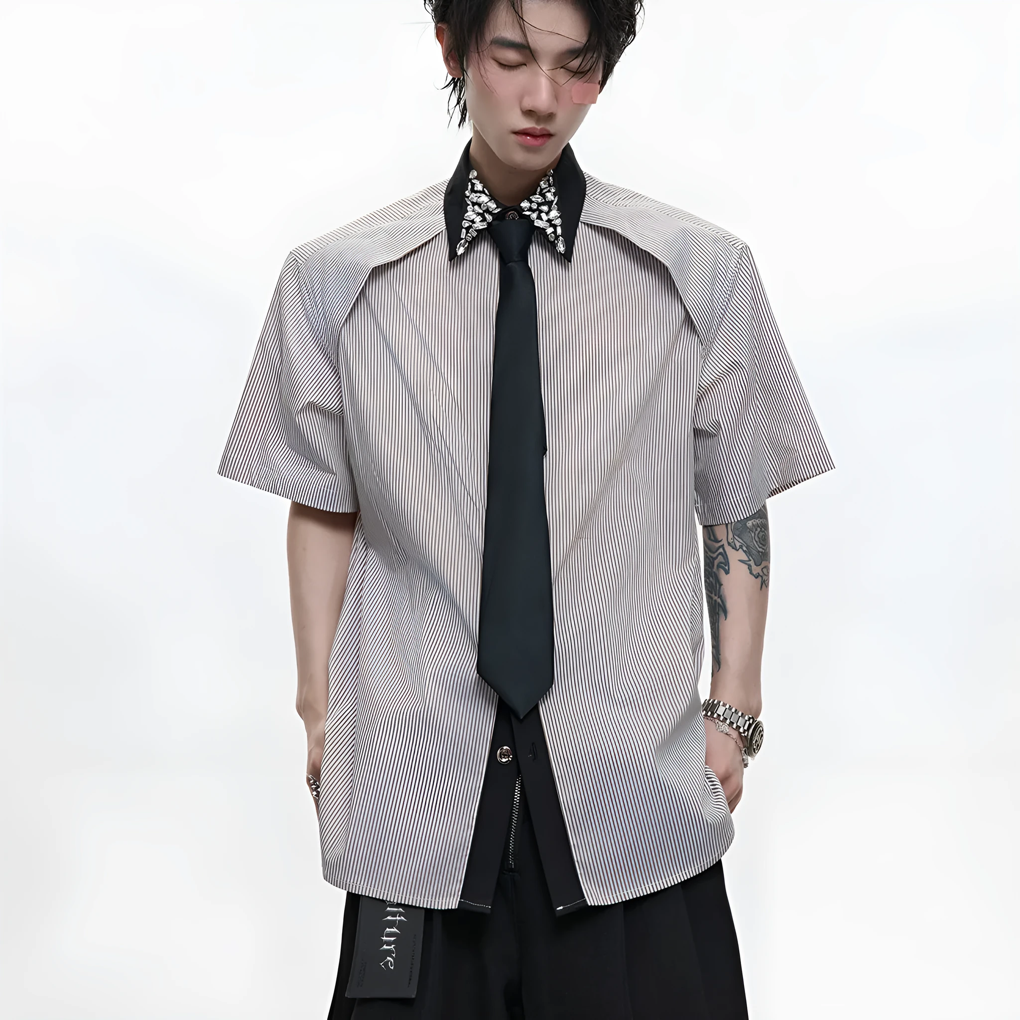Men's blue patchwork striped shirt with diamond tie detail, loose fit, and button-down collar
