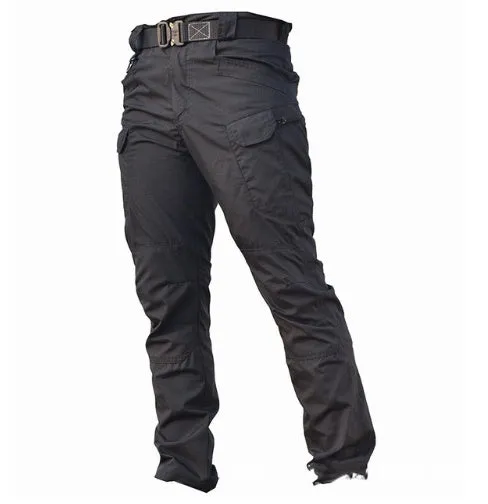 Outdoor multi-legged tactical pants in khaki cotton blend with multiple pockets on legs, shown against natural background