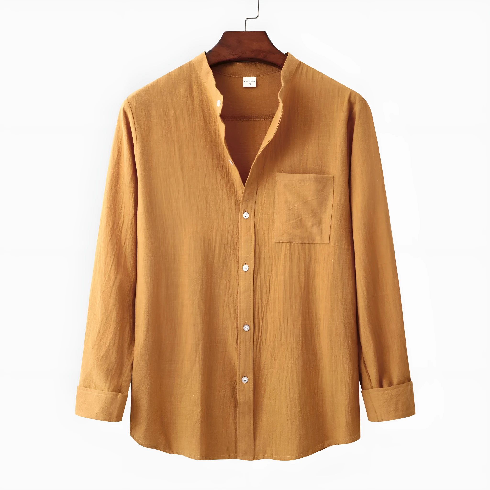 Men's brown slim cotton blend shirt with long sleeves on mannequin showing fitted design