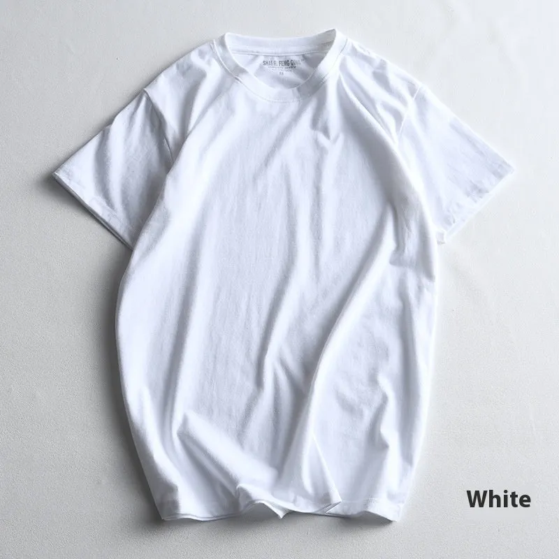 Men's solid colour cotton T-shirt on a hanger, showing round neck and short sleeve design.