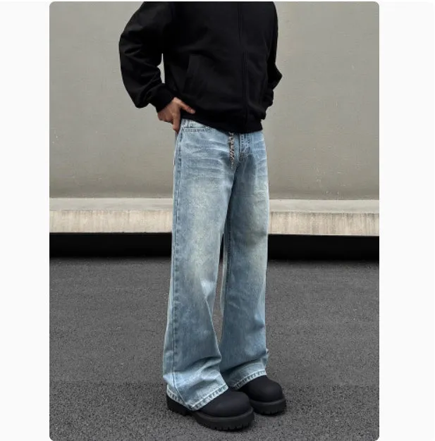 Men's blue straight-leg jeans with whisker wash detailing and a flared leg.