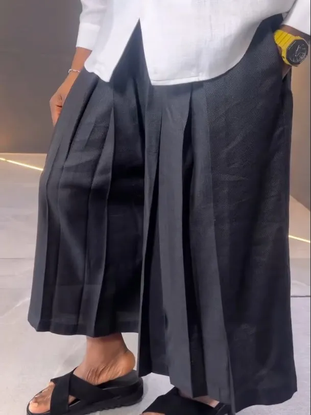 White asymmetric front long sleeve shirt with black pleated trousers casual matching set