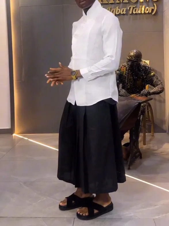 White asymmetric front long sleeve shirt with black pleated trousers casual matching set