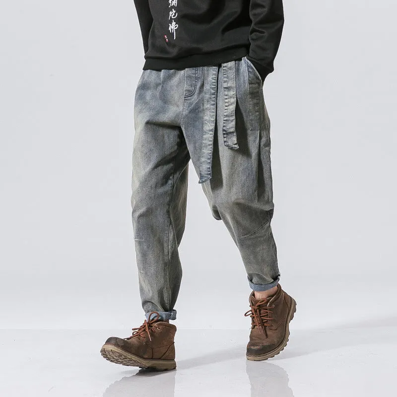 Punk stretch bike denim jeans in solid colour with elastic waist and patches