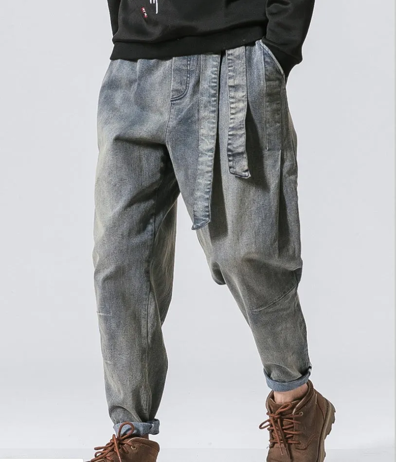 Punk stretch bike denim jeans in solid colour with elastic waist and patches